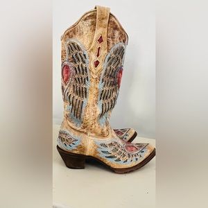 Intentionally distressed CORRAL boots. Only warn a few times .